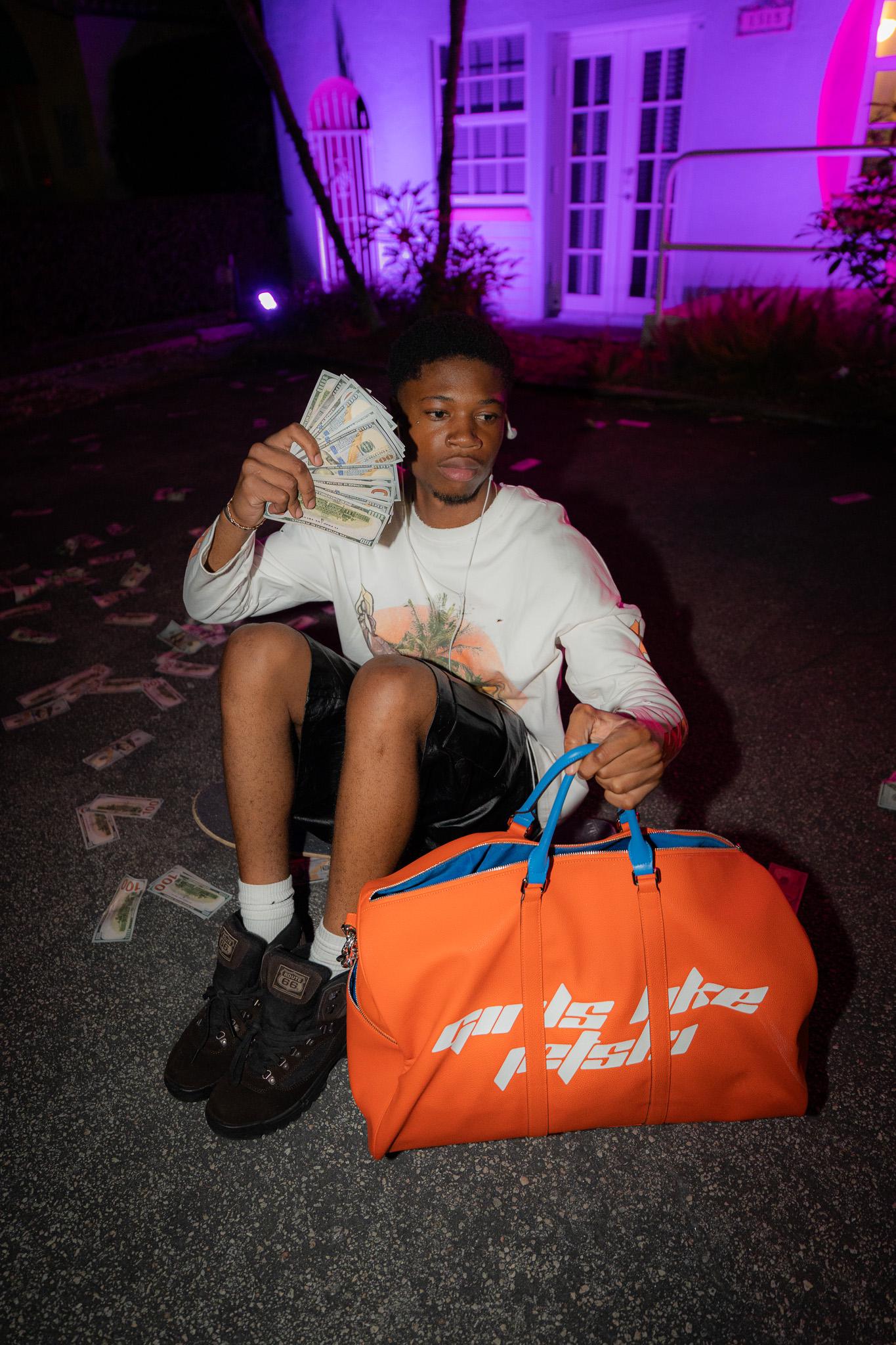 ILLUSION ORANGE TRAVEL BAG