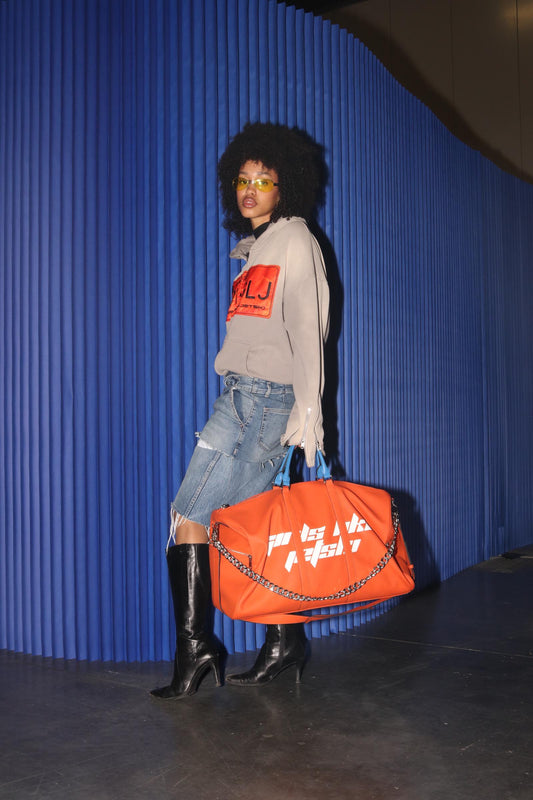 ILLUSION ORANGE TRAVEL BAG