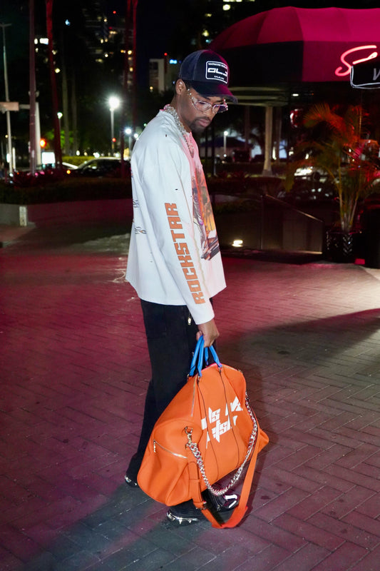 ILLUSION ORANGE TRAVEL BAG